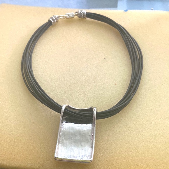 Corded necklace with silver tone piece - Picture 7 of 8